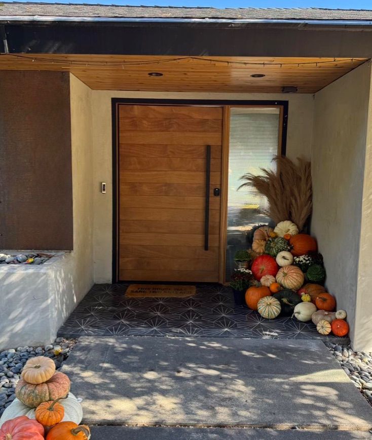 Classy Halloween front porch decor, after styling by The Pampered Porch